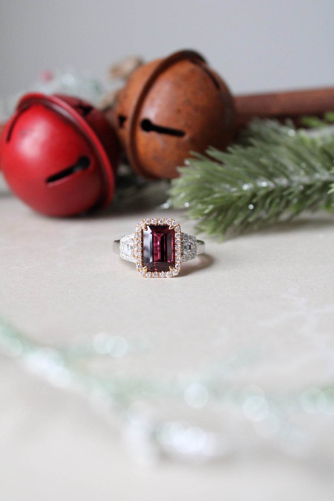 a pair of red and silver rings